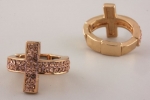Gold Casting Stretchable Cross Ring with Peach Crystals. Ring Is .75 Long.