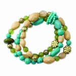 Genuine 1928 Boutique (TM) Bracelet. Gold-tone Teal, Green and Cream Beads Strech Bracelet. 100% Satisfaction Guaranteed.