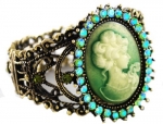 Gorgeous and Ornate Green Cameo Cuff Bracelet with Many Aurora Borealis and Green Crystal Accents - Antique Gold Tone