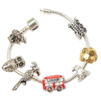 Boy Wizard Inspired Charm Bracelet (Size 8.5) - London Bus Charm, Sorting Hat Charm, Phoenix Charm, Owl Charm, Castle Charm, Stacks of Gold Coins Charm, Train Charm