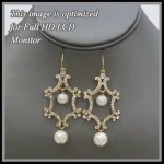 Gold Rhinestone Dangling Design Earrings with White Bead Detail.