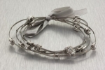 Designer Inspired Rhodium Casting Whisper Bracelet Bangle Set with Clear Crystals. Bracelet Has a 2.7 Diameter and Is .75 Thick. Nickel and Lead Compliant.