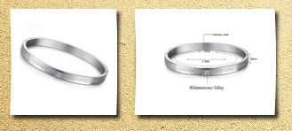 Flying Colors titanium stainless steel bracelet bangle with engraved checker board and cubic zirconia inlay oval bangle