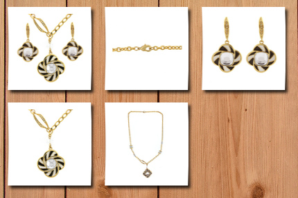 Bucasi crystal and enamel gold plated black and white art deco asymmetrical necklace and earring set